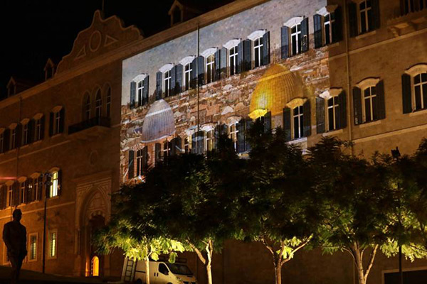 Beyrouth illuminée aux images de la mosquée al-Aqsa et de l’église du Saint-Sépulcre.
