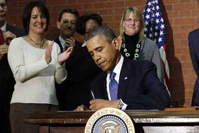 Obama promulgue le budget 2014 et met fin à la menace d'une paralysie.