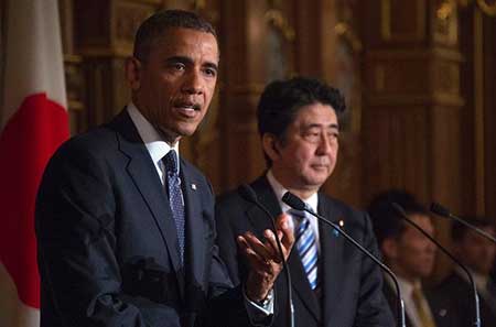 Obama rassure le Japon face à la Chine, menace Moscou sur l’Ukraine.