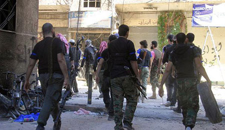 Le retrait des hommes armés de la Vieille ville de Homs a commencé