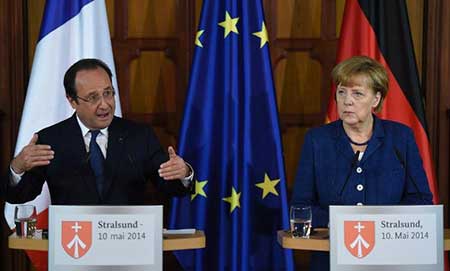 Hollande et Merkel haussent le ton pour la présidentielle en Ukraine. Hollande et Merkel haussent le ton pour la présidentielle en Ukraine