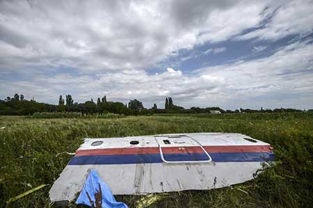 Crash en Ukraine: les corps arrivent à Kharkiv, les rebelles annoncent un cessez-le-feu.