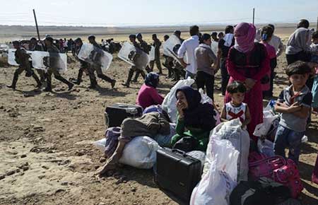 Les Turcs enlevés en Irak libérés, des milliers de Kurdes syriens fuient «Daech». Les Turcs enlevés en Irak libérés, des milliers de Kurdes syriens fuient «Daech»