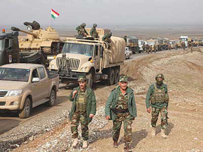Le Kurdistan approuve l’envoi de combattants à Kobané
