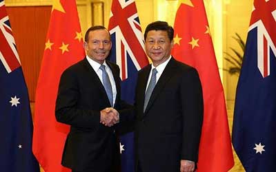 Le président chinois Xi Jinping et le Premier ministre australien Tony Abbott.