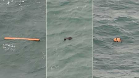 Indonésie: un corps et des débris de l’avion d’AirAsia repérés en mer. Avion d’AirAsia disparu en Indonésie: plus de 40 corps repêchés
