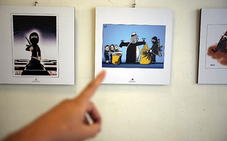 A Téhéran, des caricaturistes dénoncent la «vraie nature» de «Daech»
