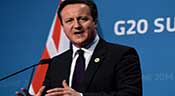 Les voyants de l’économie mondiale sont «au rouge», prévient Cameron
