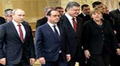 Ukraine: Merkel, Poutine et Porochenko décident de mesures concrètes
