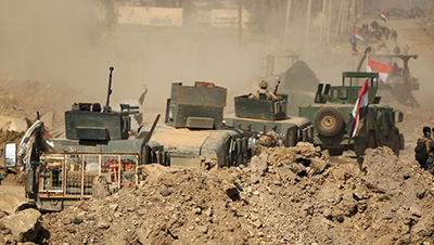 Les forces irakiennes progressent à Mossoul et appellent les civils à fuir