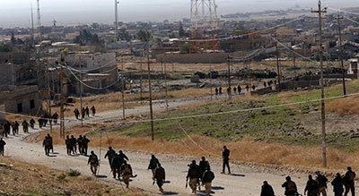 Irak : un groupe yazidi reprend Sinjar après le retrait kurde

