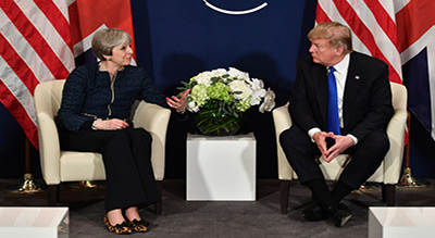 Theresa May préférerait que Donald Trump évite Londres
