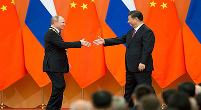 Poutine et Xi s’efforcent de resserrer les rangs face aux défis de Donald Trump


