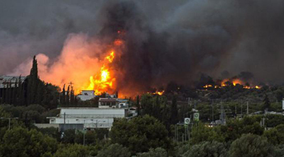 Grèce: des dizaines de morts dans de violents incendies autour d’Athènes