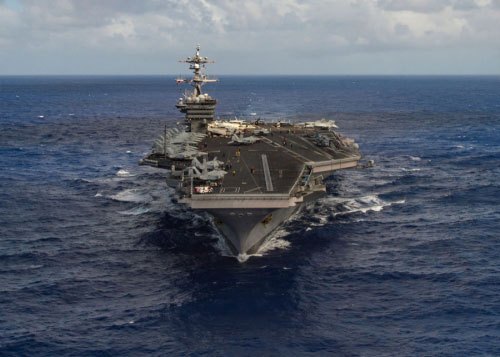 Corée du nord: des navires russes et chinois surveillent l’USS Carl Vinson