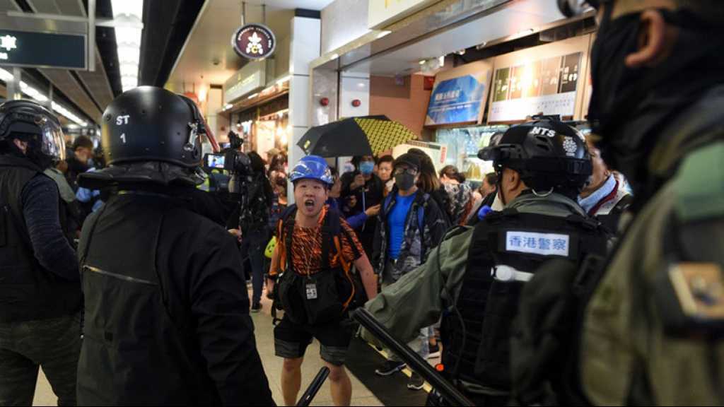 Hong Kong: accalmie rompue par des affrontements dans des centres commerciaux