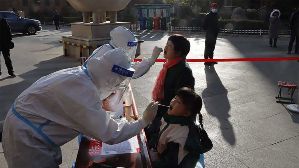 Omicron: hausse d’hospitalisations attendue par l’OMS, restrictions en Chine et en Allemagne